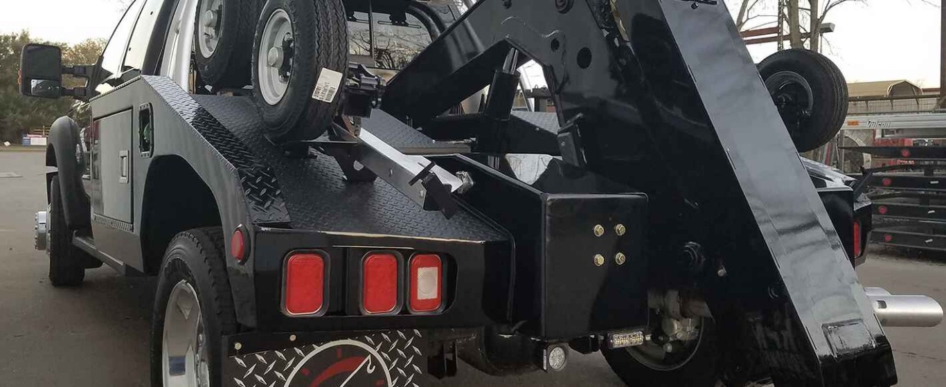 Heavy-duty tow truck providing emergency towing services in Upland, CA